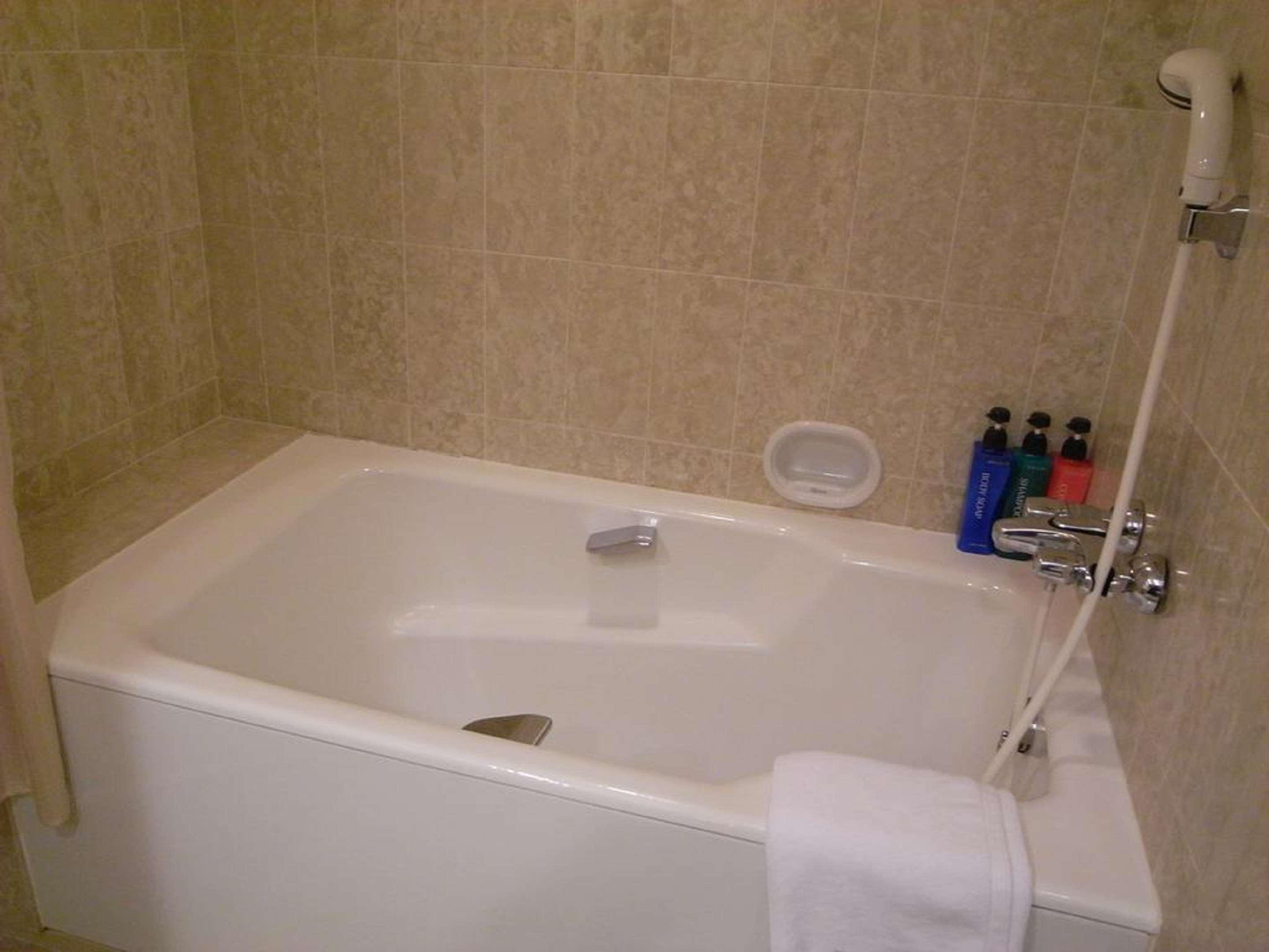 The Global View Nagasaki Exterior foto A bathtub with a shower