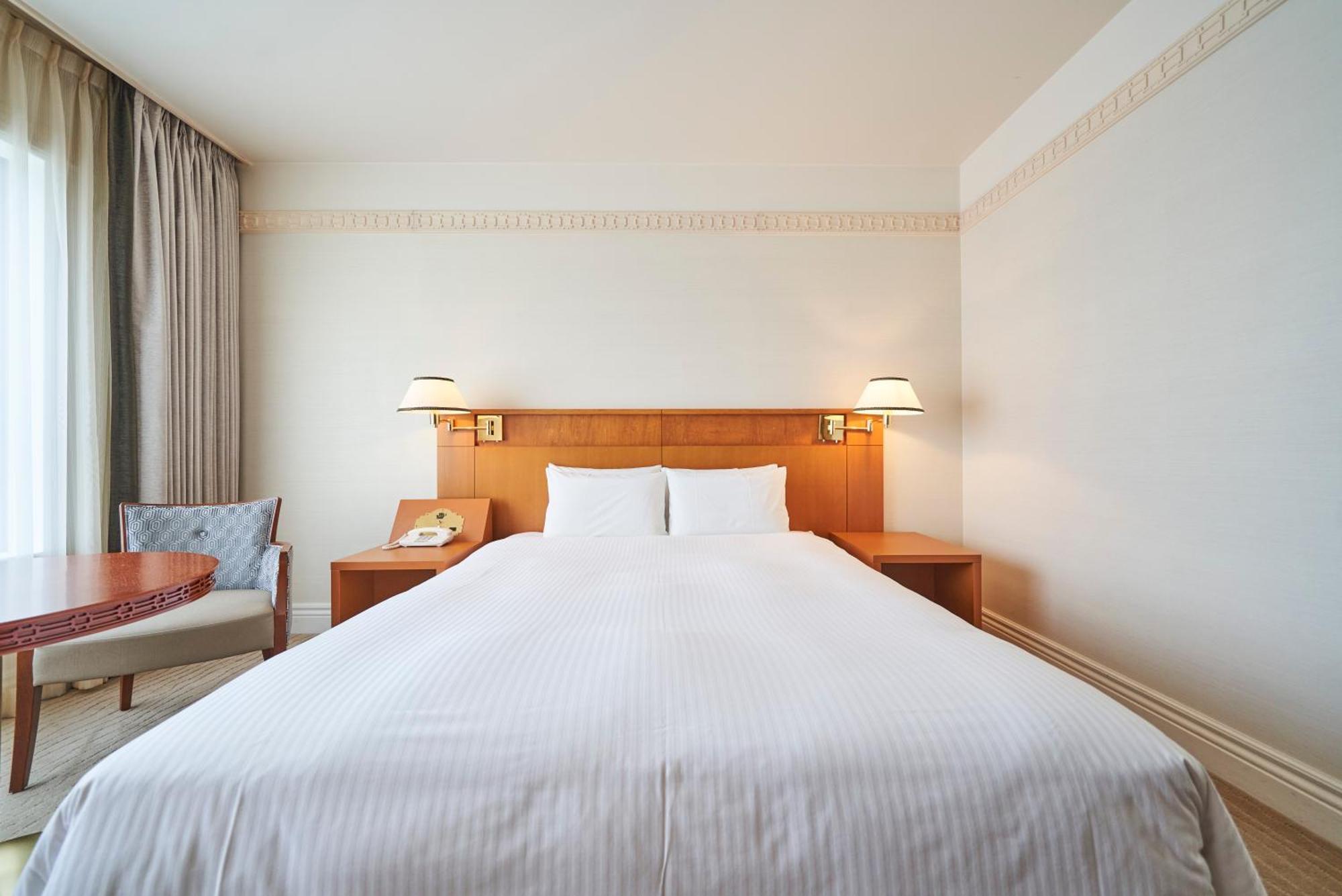 The Global View Nagasaki Exterior foto A bed